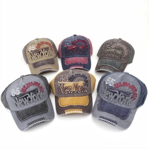 Vintage washed baseball cap in six colors with New York 85 embroidery and distressed brim