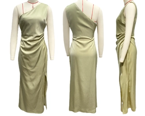 Detail view of olive green satin dress showing one-shoulder design and side slit on mannequin