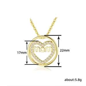 Gold MOM necklace with heart-shaped pendant featuring sparkling cubic zirconia stones