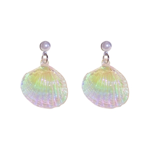 Iridescent shell-shaped pearl earrings with rainbow shimmer on a white background