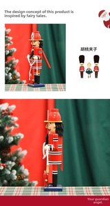 Detail of hand-painted wooden firefighter nutcracker with red uniform and rope accessory