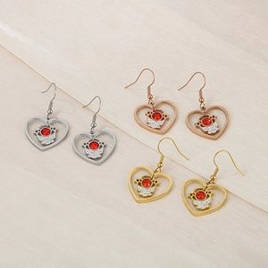 French style heart drop earrings with red stone inlay in silver, rose gold, and gold