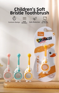 Detail of 0.08mm soft bristles and suction cup base on cartoon duck baby toothbrush