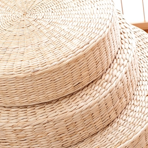 Handcrafted round straw tatami floor cushion set with natural woven texture