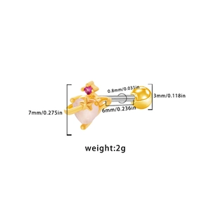 Detailed dimensions of gold planet earring with pink heart gem and piercing measurements