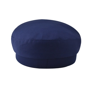 Detailed stitching on navy blue baker boy hat with classic flat top structure