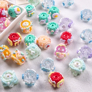 Close-up of colorful DIY floral oil beads for spring-themed phone strap accessories