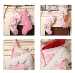 Pink velvet Christmas stocking detail featuring sequins and 3D plush Santa Claus design
