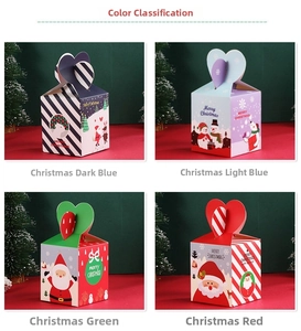 Detail of four festive Christmas gift boxes with heart closure and holiday patterns