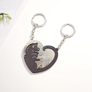 Creative black and white cats hugging in heart shape couple keychain for Valentines