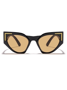 Close-up of black cat-eye sunglasses with yellow lenses and golden metal accents
