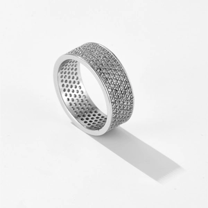 Sparkling silver eternity ring with micro-pave diamonds and interior honeycomb cutouts