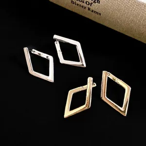 Minimalist geometric rhombus hoop earrings in polished gold and silver finishes