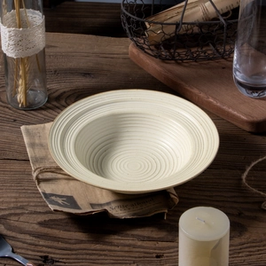 Japanese style cream ceramic pasta plate with spiral texture and straw hat shape