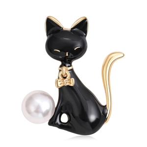 Creative black enamel cat brooch with gold trim and white pearl accent on a white background