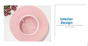 Detail view of pink straw hat interior with sweatband and breathable woven texture