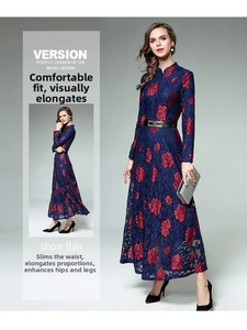 Detail of dark blue lace maxi dress with red floral embroidery and stand collar