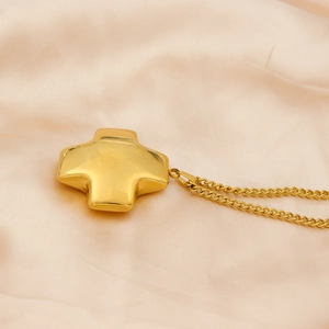 Gold hollow cross pendant necklace in stainless steel with a sleek minimalist design