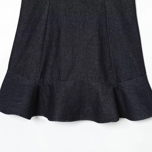Fashionable dark blue denim mini dress featuring stylish tiered ruffle hem details