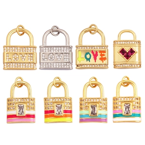 Mini copper pendants with lock and key designs featuring micro-pave cubic zirconia stones
