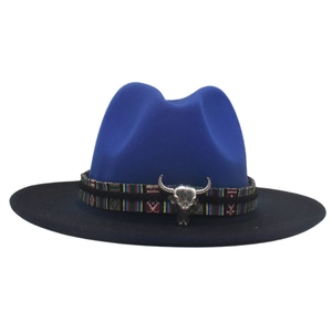 Detail of blue and black fedora hat with ethnic woven band and silver bull skull ornament