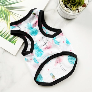Summer pet vest with flamingo and pineapple prints for small dogs and cats on marble