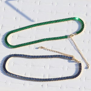 Golden chain necklace with green and blue square zircon crystals and lobster clasp