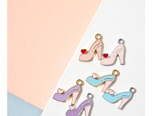 Detail view of colorful high heel charms with heart accents for DIY jewelry
