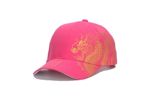 Close-up of golden dragon pattern printed on pink cotton canvas baseball cap
