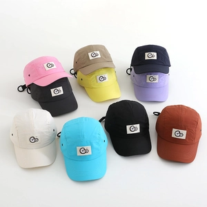 Detail of adjustable buckle strap and breathable metal eyelets on quick-dry camper caps