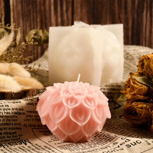 Detailed view of 3D lotus flower silicone mold with pink scented candle craft finished