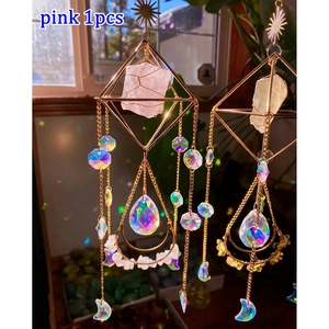 Pink crystal suncatcher detail showing gold metal moon frame and light prisms