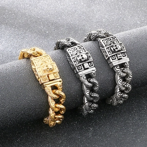 Detail of gothic punk skull buckle on heavy cuban link steel bracelets in three finishes