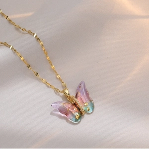 Elegant titanium steel necklace featuring a gradient purple butterfly pendant with gold foil
