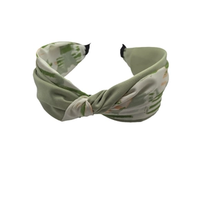 Elegant color-block knotted headband with green and white floral print fabric