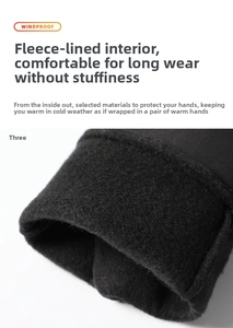 Detail of soft fleece lining inside windproof black winter gloves for warmth