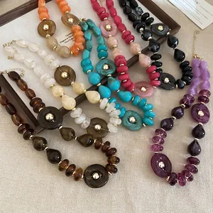 Irregular acrylic chunky jewelry set with colorful resin beads and gold accents