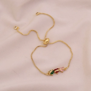 Gold-tone adjustable slider bracelet featuring green, red, and pink heart crystals