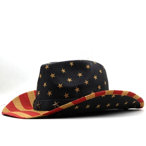 Detailed close-up of woven paper straw cowboy hat with American flag stars and stripes pattern
