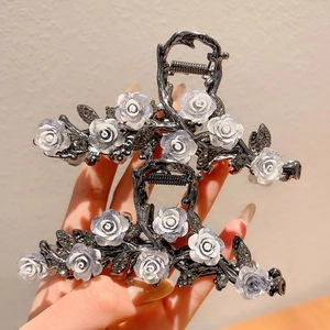 Elegant floral hair claw clips with white camellia flowers and black rhinestones for women