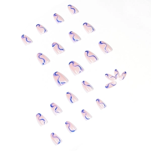 Pop art wavy line press-on nails in nude, blue and purple with a coffin shape