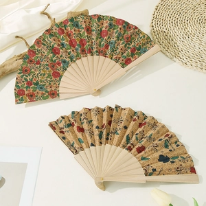 Vintage cork folding fan with colorful floral patterns and elegant wooden frame for decor