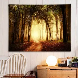 Detail of forest sunrise tapestry showing light rays on lightweight polyester fabric