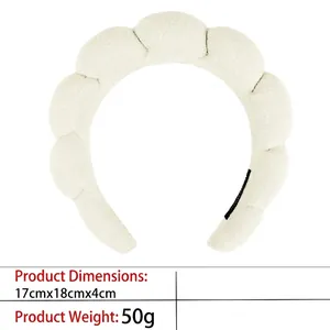 Detail view of thickened off-white sponge headband with wave edges and 17x18x4cm dimensions