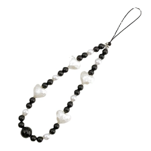Beaded black and white heart phone charm strap with acrylic beads on white background
