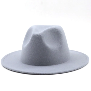 Detail of light grey wool fedora hat showing wide brim and classic indented crown top