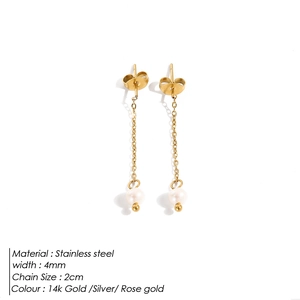 Detail view of pearl long chain earrings in stainless steel with 14k gold plating details