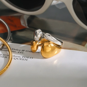 Minimalist double-layer 18k gold and silver stainless steel ring in organic pebble shape