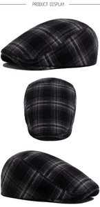Detail view of classic black and grey plaid flat cap in British vintage style