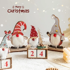 Nordic wooden Christmas countdown calendar with gnome ornaments and Merry Christmas text